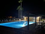 Nighttime view of the pool at the SPI Golf Club